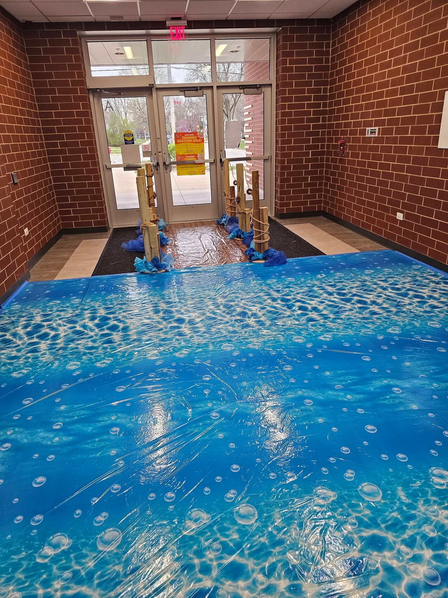 Ocean-themed entrance with blue bubble floor decor
